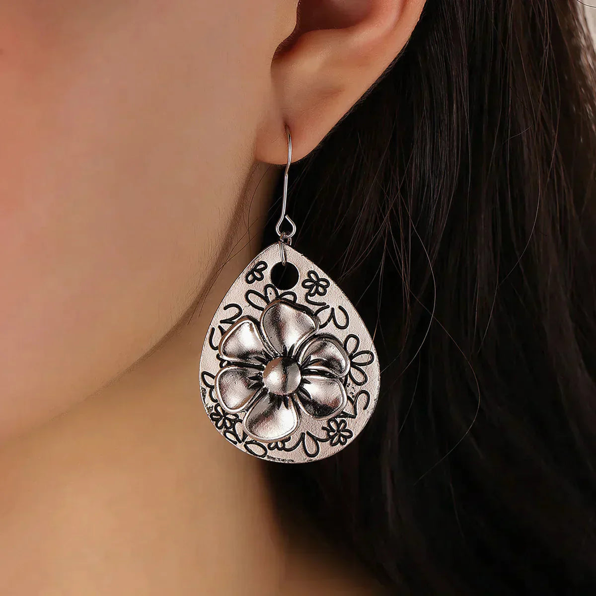 Elegant Silver Boho Earrings with Enchanting Flower Designs