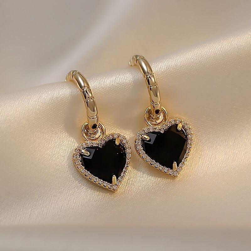 Elegant Gold Earrings with Heart Design in Black