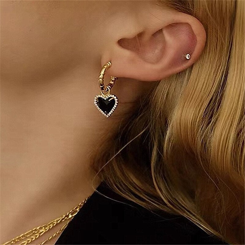 Elegant Gold Earrings with Heart Design in Black