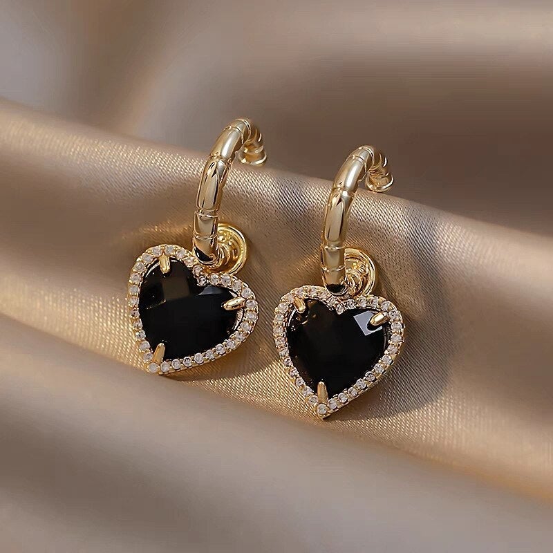 Elegant Gold Earrings with Heart Design in Black