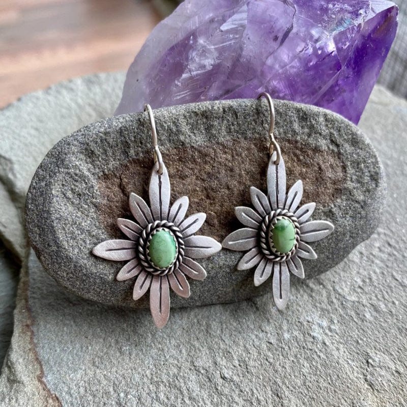 Elegant Sterling Silver Lotus Earrings with Sparkling Green Stones