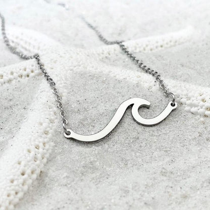 Elegant necklace with silver ocean wave design