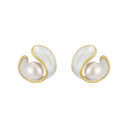 Elegant gold earrings with shining white opal and fine pearl