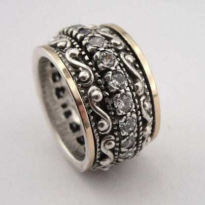 Fine ring with intricately carved gemstone