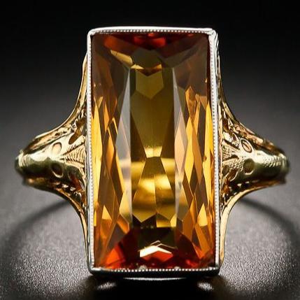 Fascinating ring made of luminous orange glass