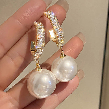 Elegant pearl earrings with sparkling zirconia