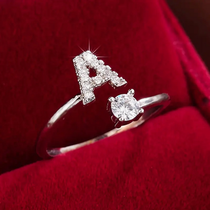 Elegant diamond letter ring made of gold and silver