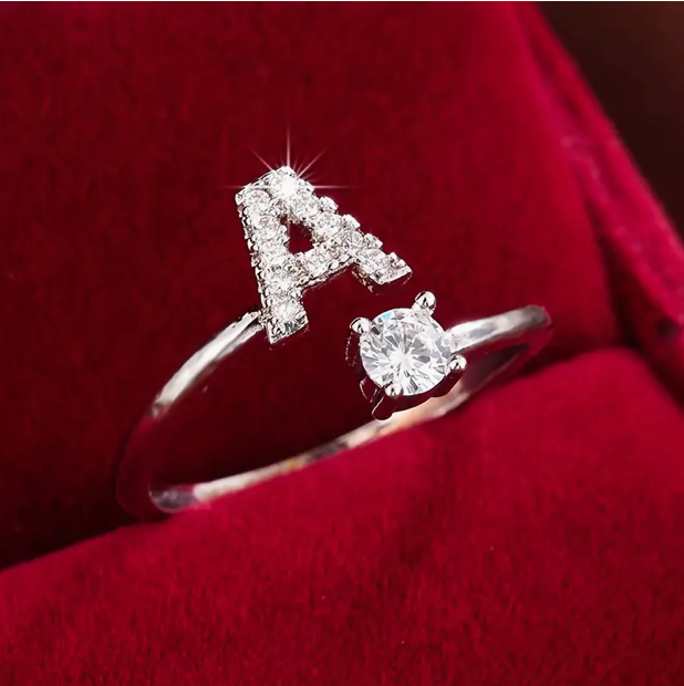 Elegant diamond letter ring made of gold and silver