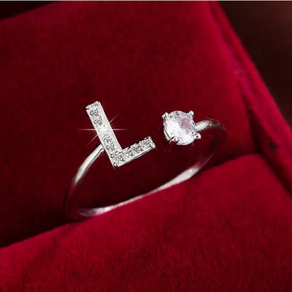 Elegant diamond letter ring made of gold and silver