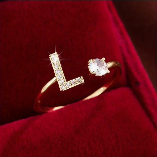 Elegant diamond letter ring made of gold and silver