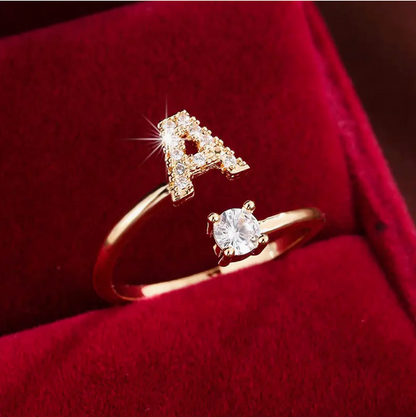 Elegant diamond letter ring made of gold and silver