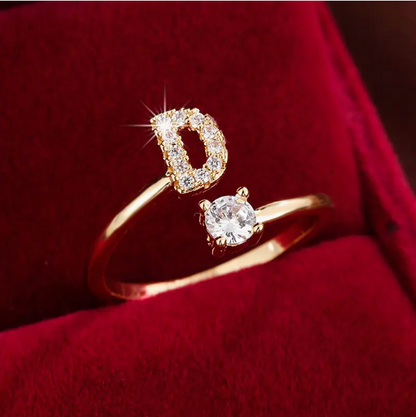 Elegant diamond letter ring made of gold and silver