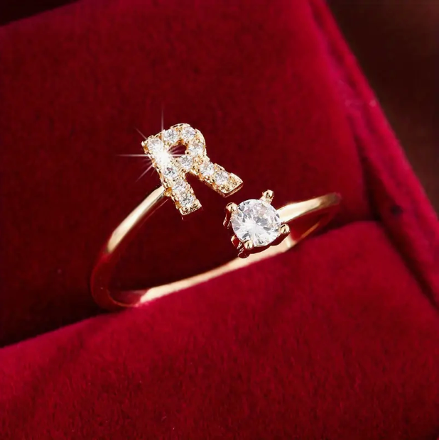 Elegant diamond letter ring made of gold and silver