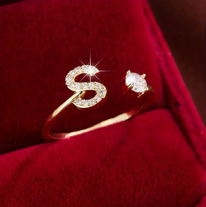 Elegant diamond letter ring made of gold and silver