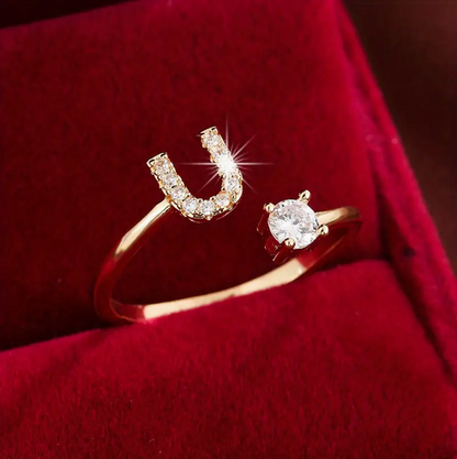 Elegant diamond letter ring made of gold and silver