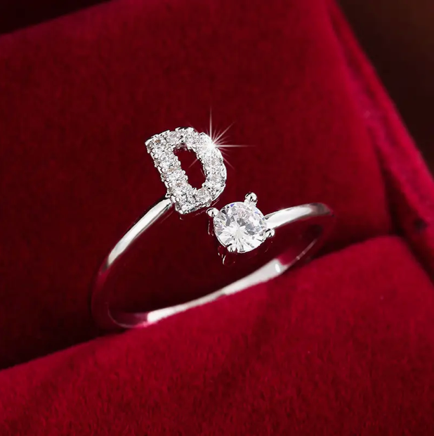 Elegant diamond letter ring made of gold and silver