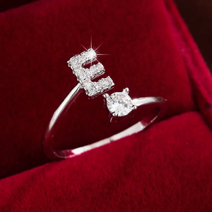 Elegant diamond letter ring made of gold and silver