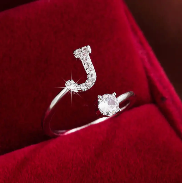 Elegant diamond letter ring made of gold and silver