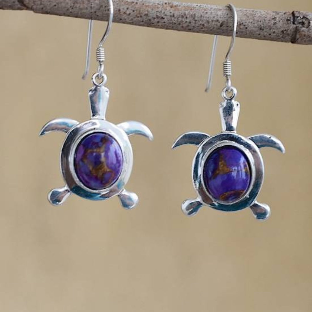 Fascinating sterling silver earrings with turtle design and sparkling opal in Boho style