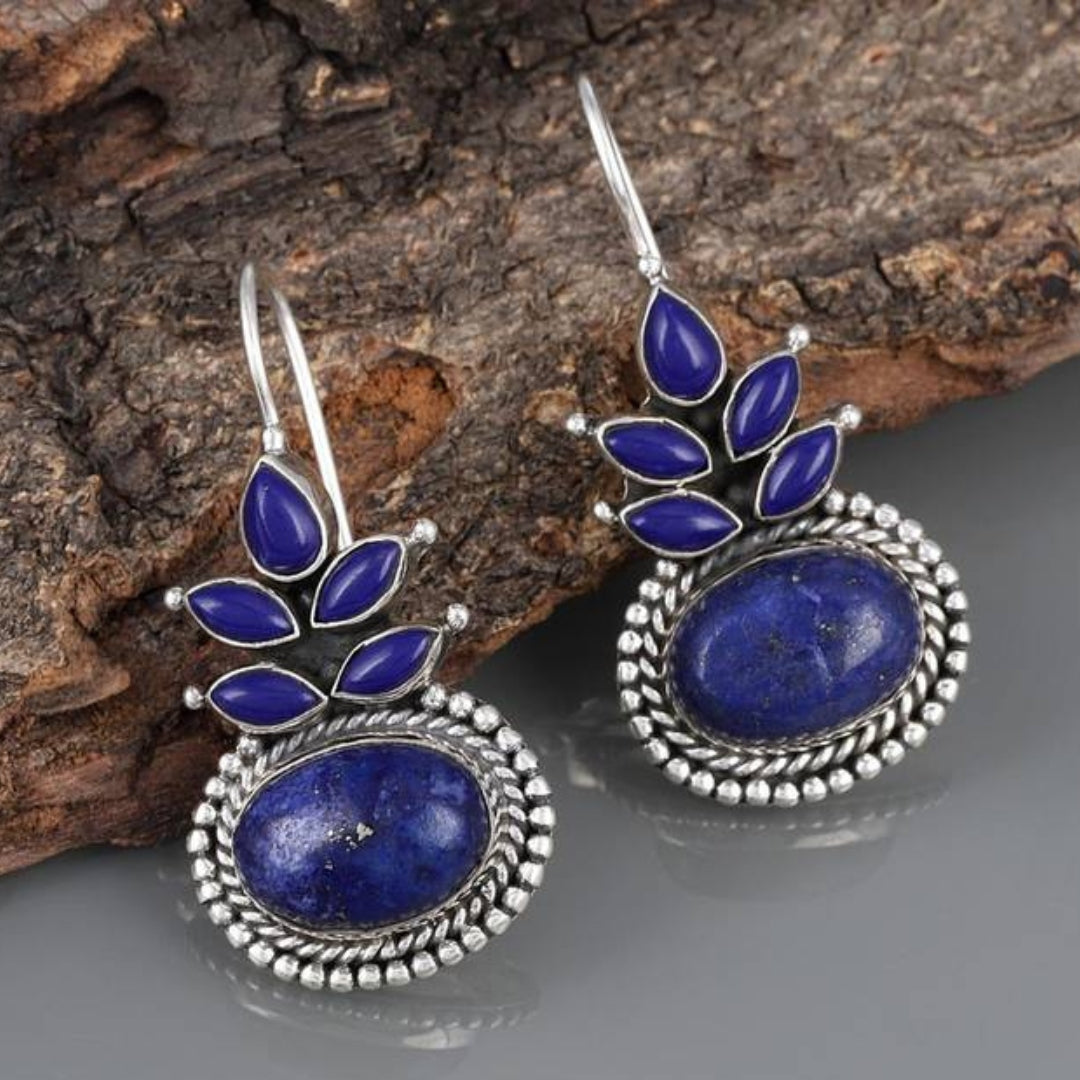 Enchanting Boho earrings with sparkling blue opal and delicate flowers made of sterling silver