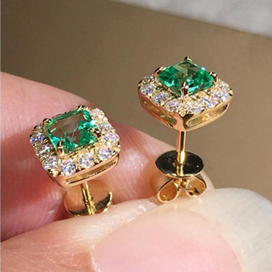 Elegant earrings with sparkling green crystal and exquisite gold design