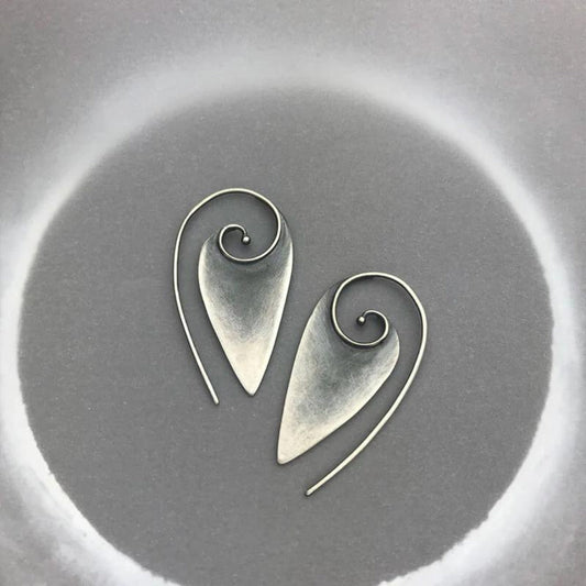 Elegant silver-plated earrings with spiral design