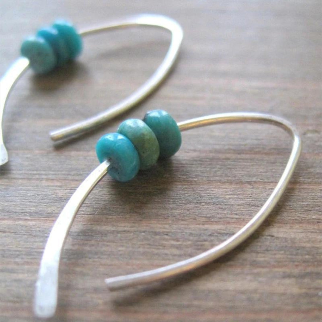 Wave-shaped Boho earrings with turquoise stones in fine sterling silver