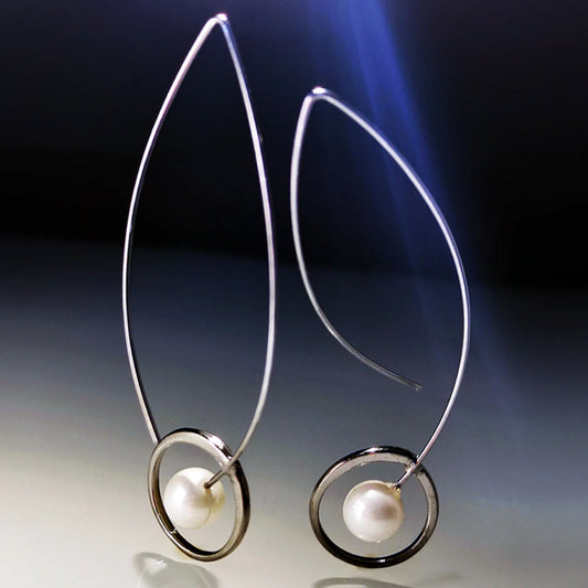 Elegant Silver Boho Earrings with Radiant Pearls