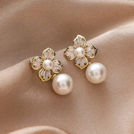 Elegant crystal flower earrings with shimmering gold beads