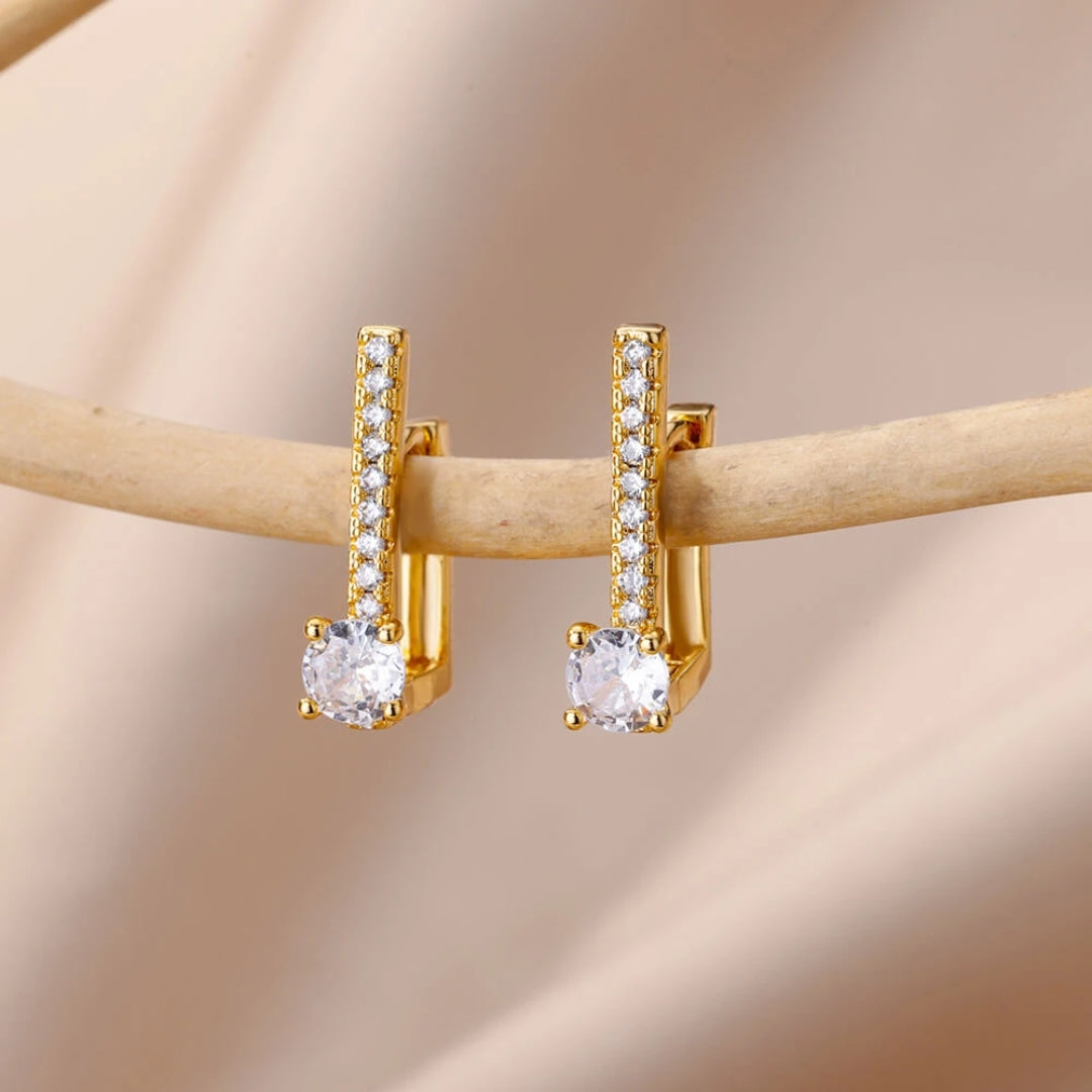 Seductive gold-plated earrings with sparkling zirconia shine