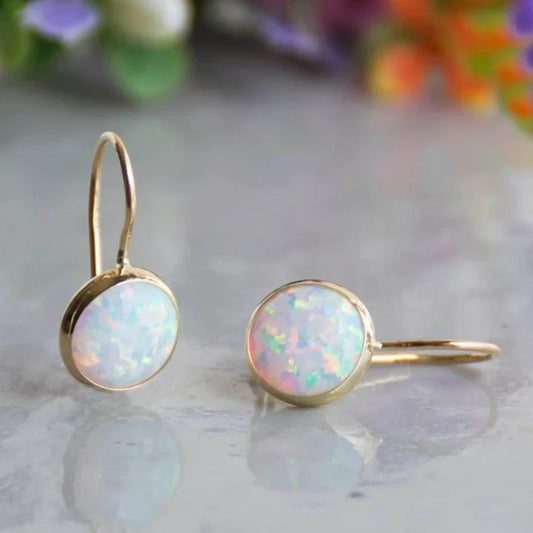 Elegant Vintage Gold Earrings with Radiant White Opal