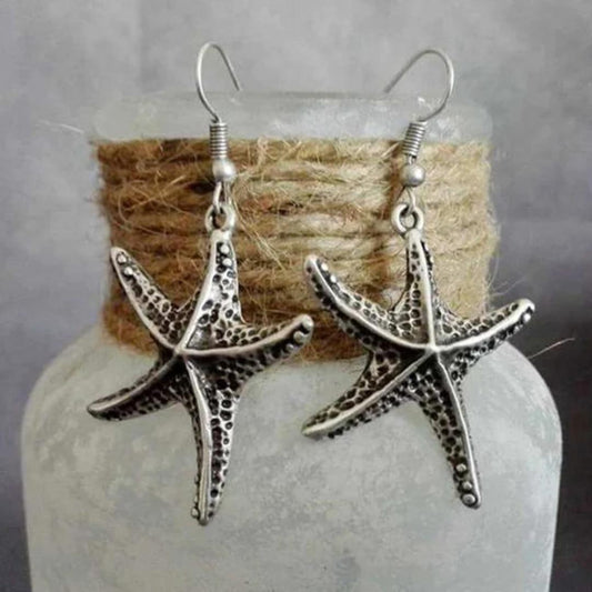 Elegant Vintage Silver Earrings in Classic Star Design