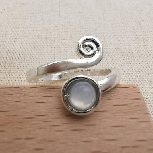 Elegant spiral ring with radiant vintage moonstone