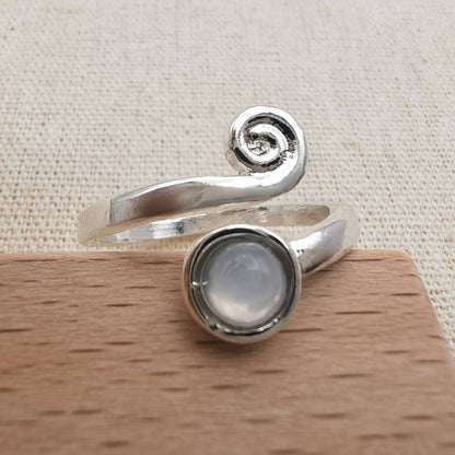 Elegant spiral ring with radiant vintage moonstone