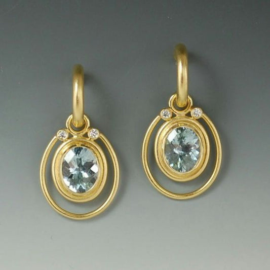 Elegant Vintage Earrings in Gold with Sparkling Blue Crystal Accent