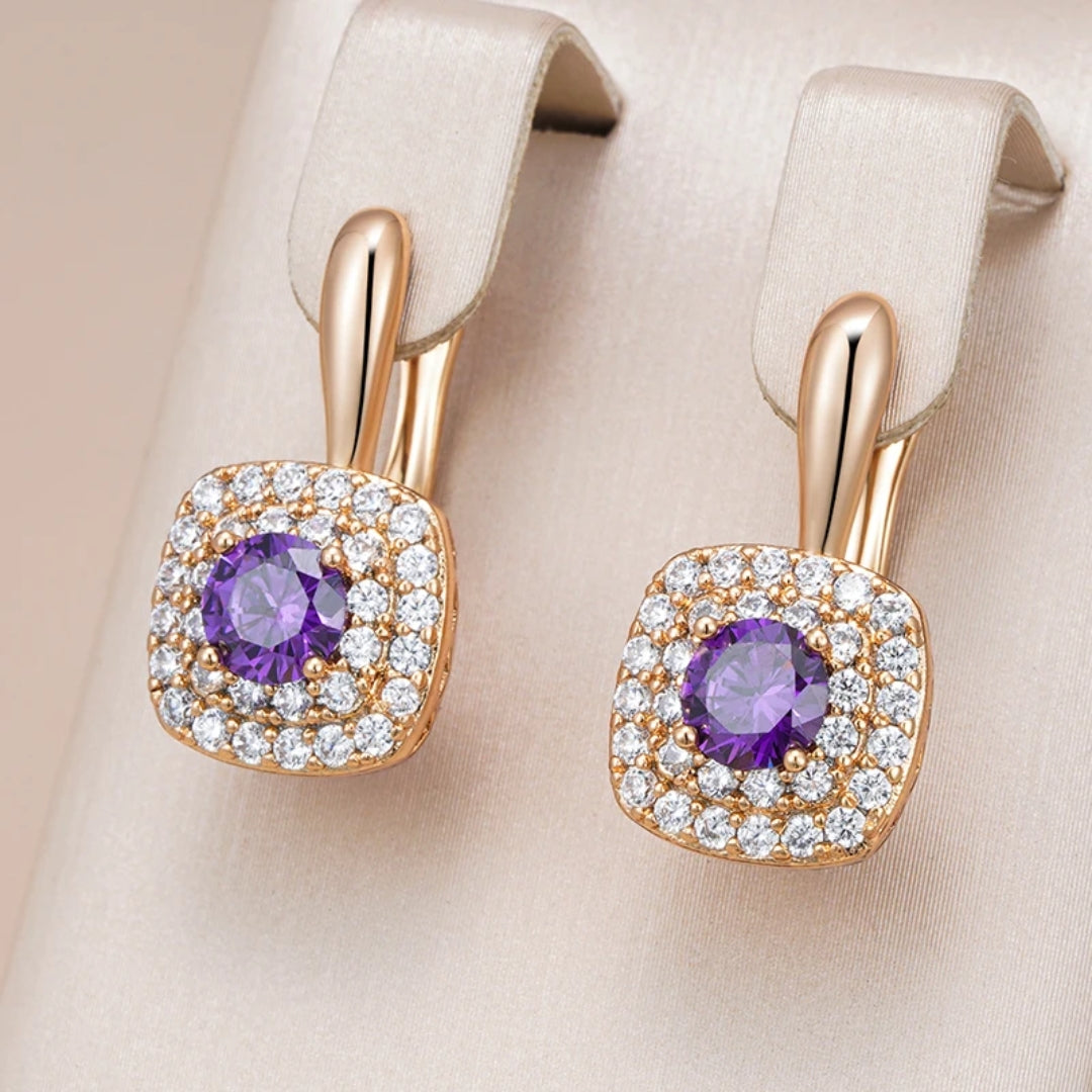 Shining purple glitter earrings with elegant gold accents