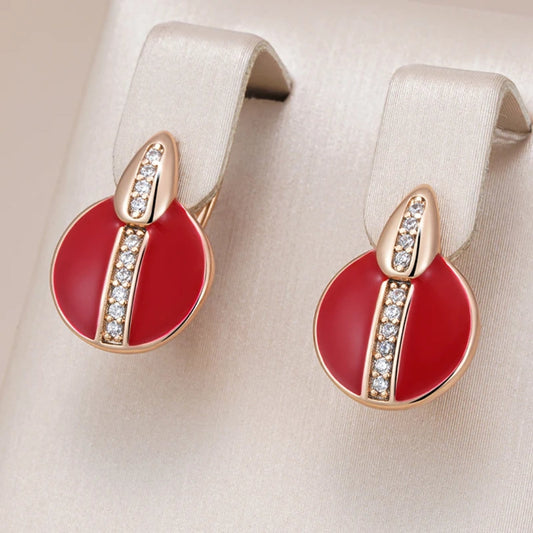 Artful earrings with a radiant red enamel finish