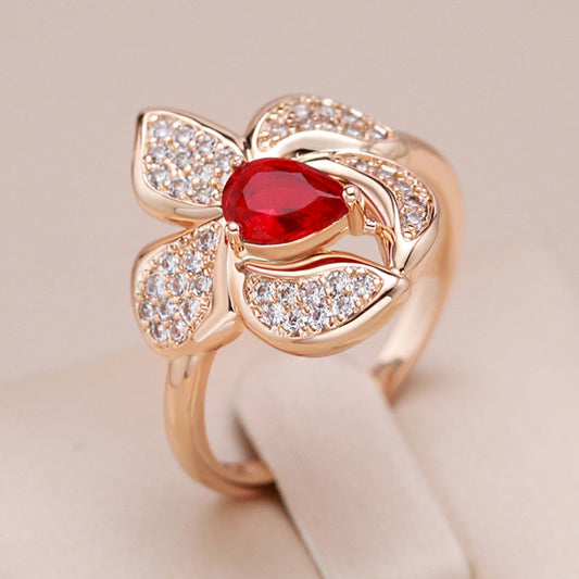 Fascinating ring with a radiant red-gold crystal