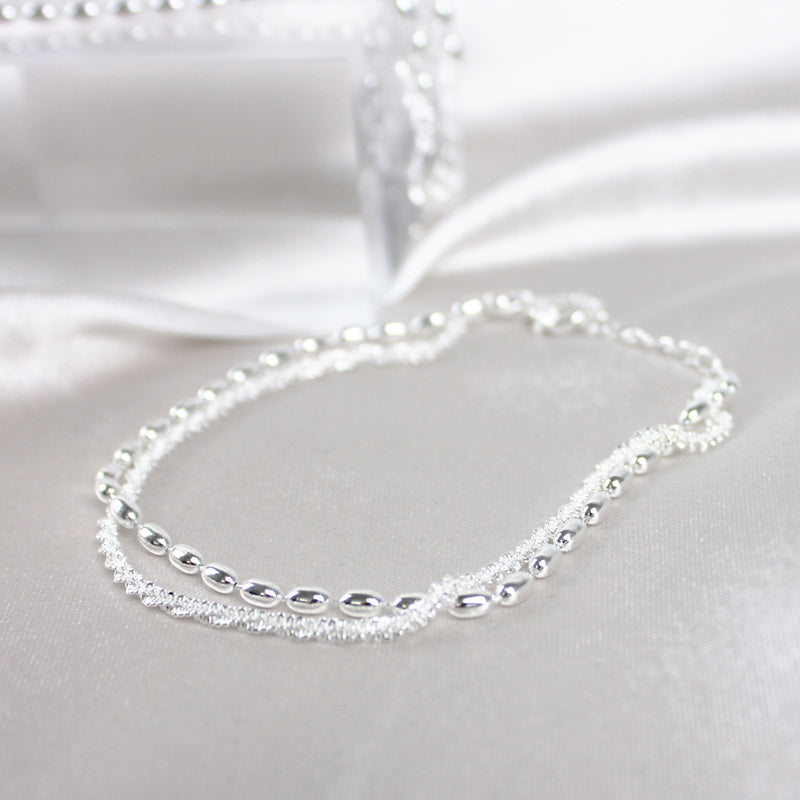 Elegant bracelet with sparkling zirconia stones in silver