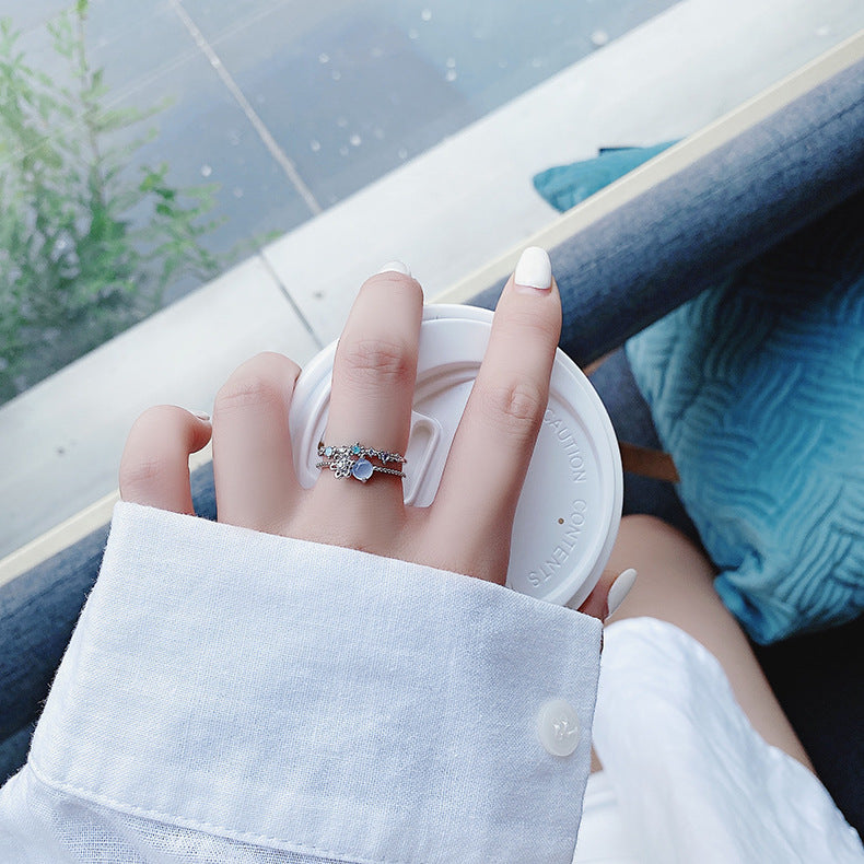 Elegant adjustable silver ring with sparkling moonstone