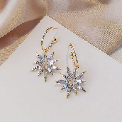 Elegant star earrings in exquisite gold and silver