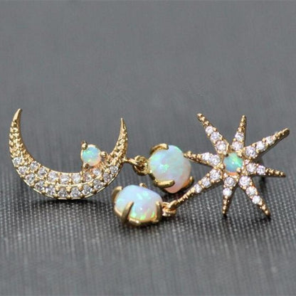 Elegant gold and opal earrings with crescent and star-shaped design