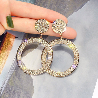 Elegant zirconia earrings in radiant gold and silver