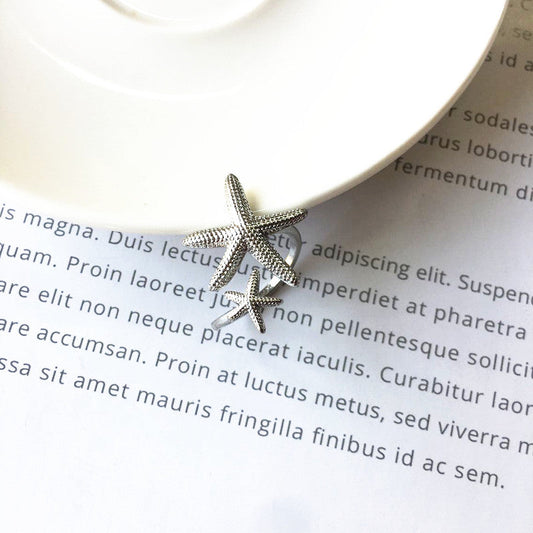 Elegant adjustable starfish ring made of silver and gold