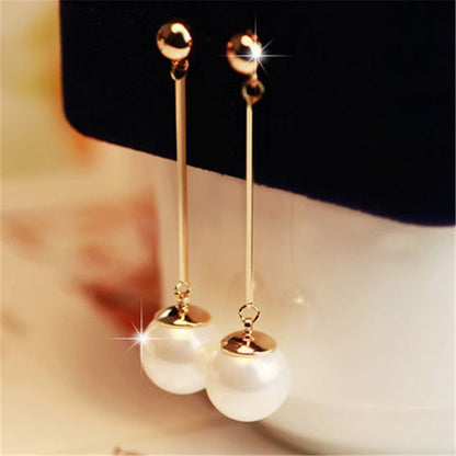 Elegant swinging earrings with exquisite hand-picked pearls