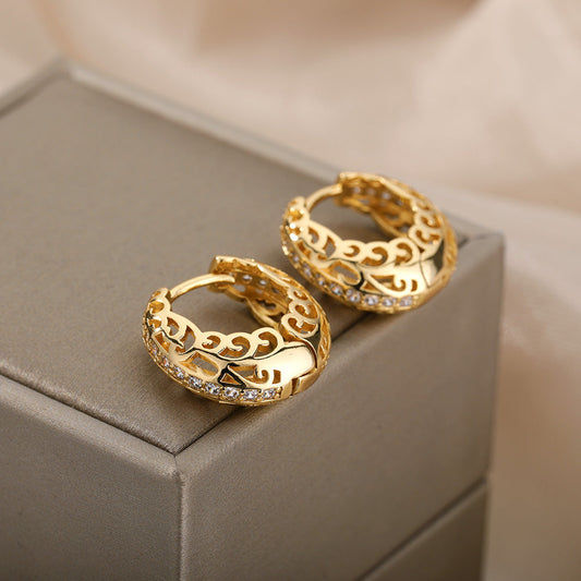 Elegant gold Mandala earrings in minimalist design