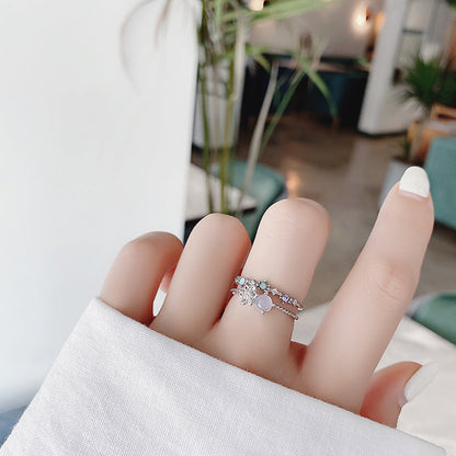 Elegant adjustable silver ring with sparkling moonstone