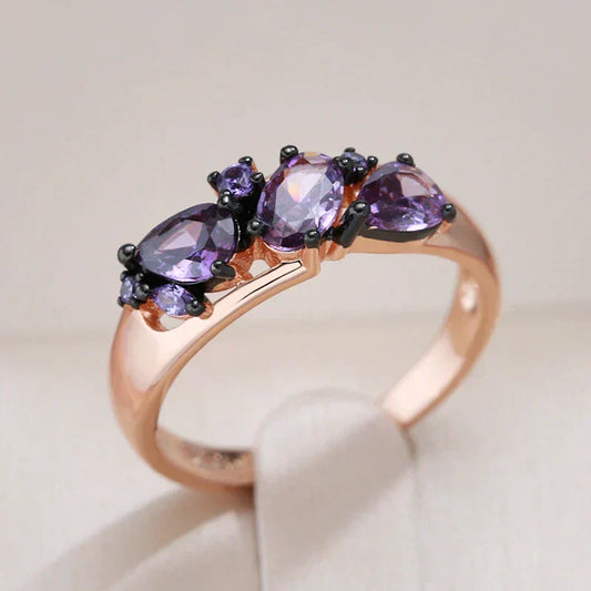 Shimmering golden ring with sparkling purple crystals