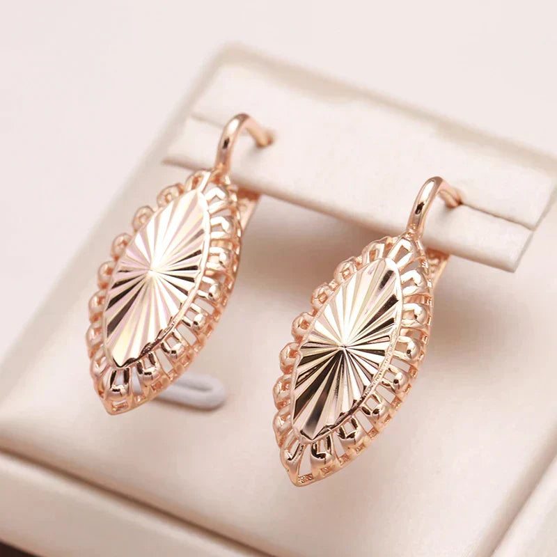 Sparkling gold shield earrings for a touch of elegance