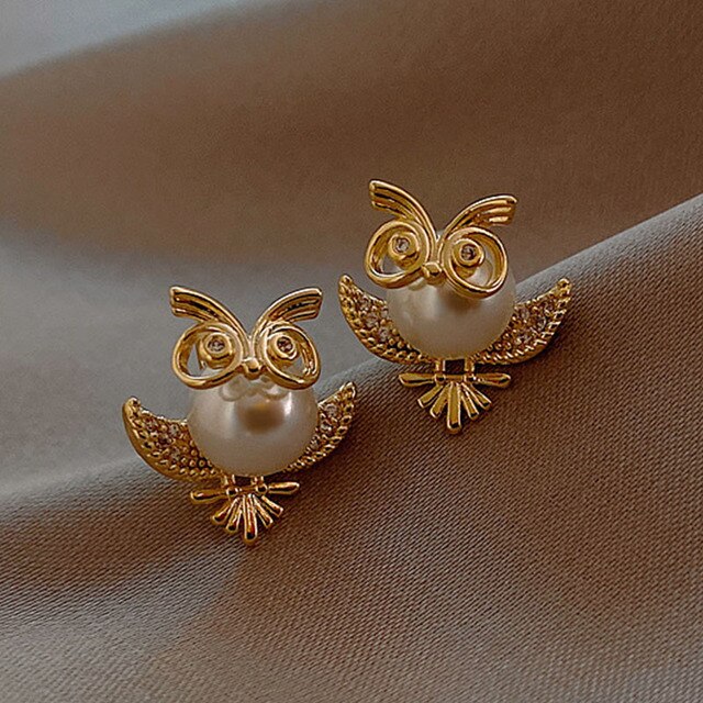 Exquisite golden owl earrings for an elegant accent